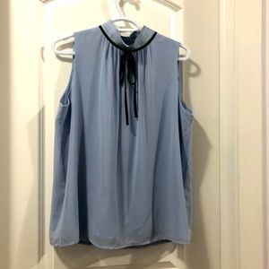 Work approves or wear with jeans sleeveless top